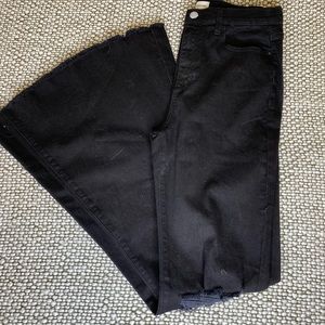 Sneak Peak Bell Bottoms, black denim, ripped knee.